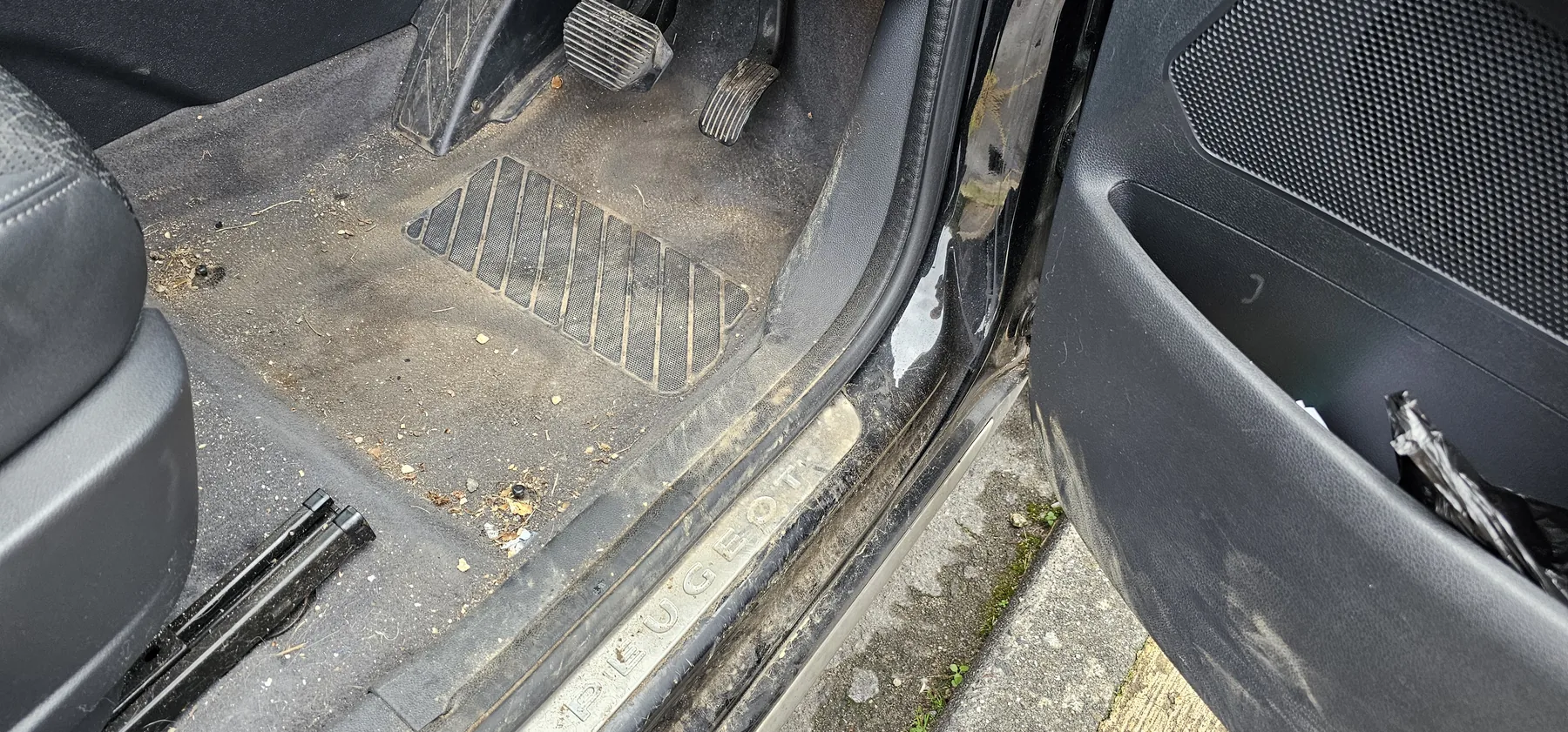 Vehicle footwell before cleaning