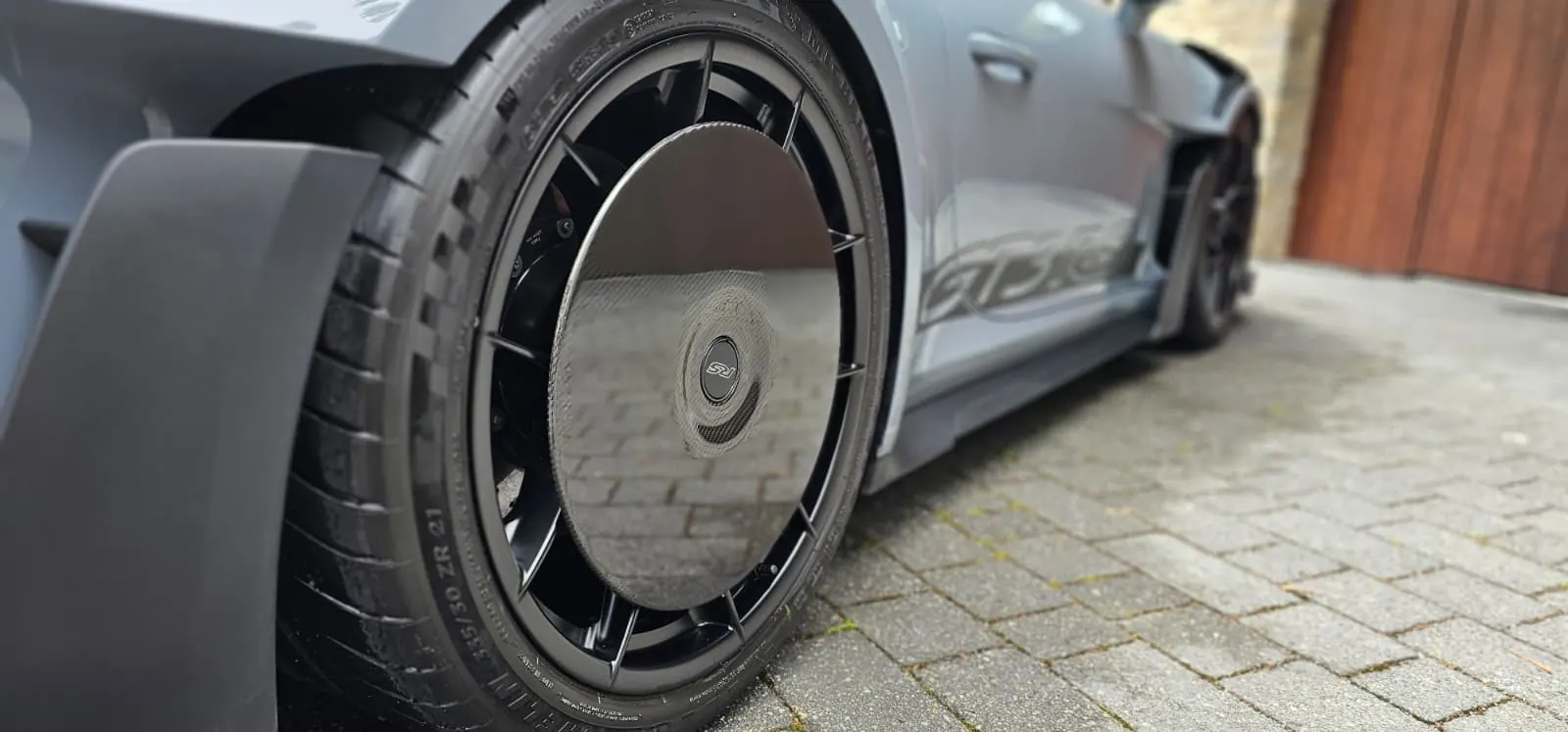 Close detail of a Porsche GT3 RS wheel and tyre after finishing work