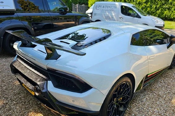 White performance car after a Platinum Car Cleaning exterior clean